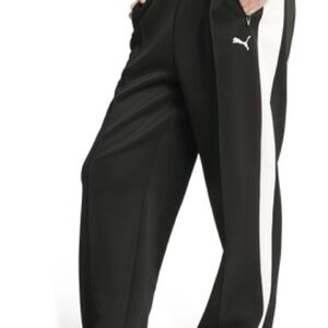 Puma women’s Black Joggers with White Stripe